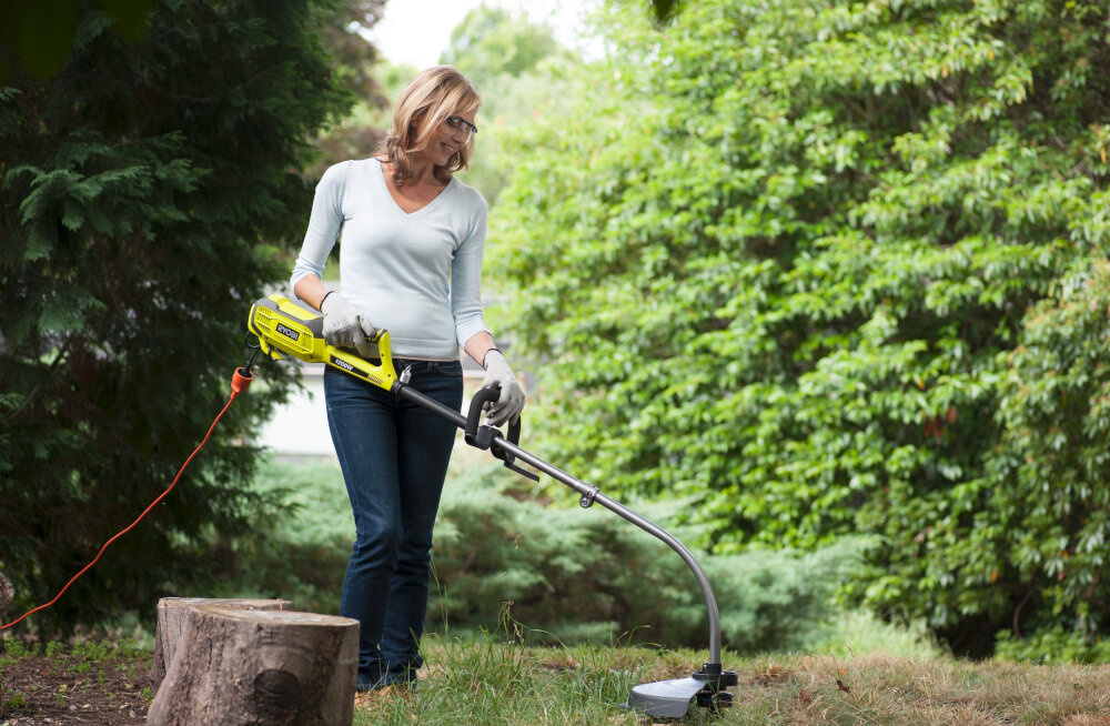 Podkaszarka elektryczna RYOBI RLT1238I solidny sprzęt niska waga 4,9 kg niski poziom głośności 93,7 dB