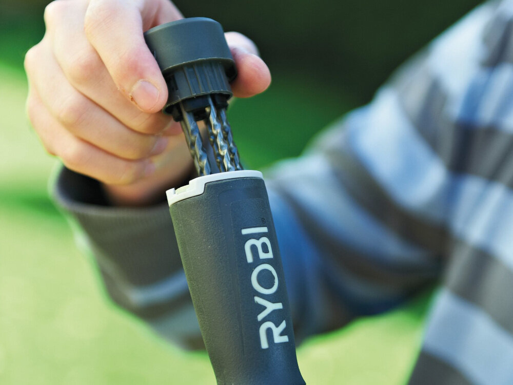 Wiertarka udarowa RYOBI RPD1010-K regulacja prędkości obrotów w przód i wstecz metalowa obudowa przekładni bezkluczykowy uchwy średnica trzpienia w stali do 13 mm w betonie do 20 mm w drewnie do 50 mm