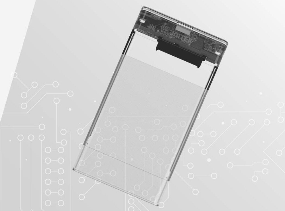 Obudowa dysku UNITEK S1103A Przezroczysta obudowa na dysk twardy z widocznym, czarnym złączem w środku, ułożona skośnie na jasnoszarym tle z bladym wzorem ścieżek elektronicznych