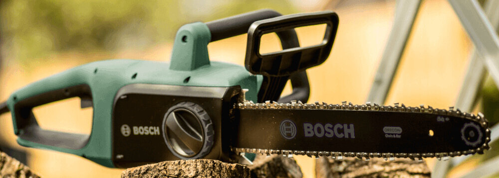 Piła elektryczna BOSCH Universal Chain 35 w zestawie łańcuch tnący osłona łańcucha instrukcja obsługi w polskiej wersji językowej karta gwarancyjna