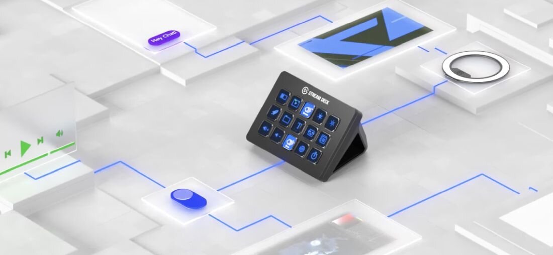Na obrazie znajduje się panel z przyciskami, na którym widnieje napis \'STREAM DECK\'. Panel jest otoczony różnymi ikonami i symbolami na białym tle.