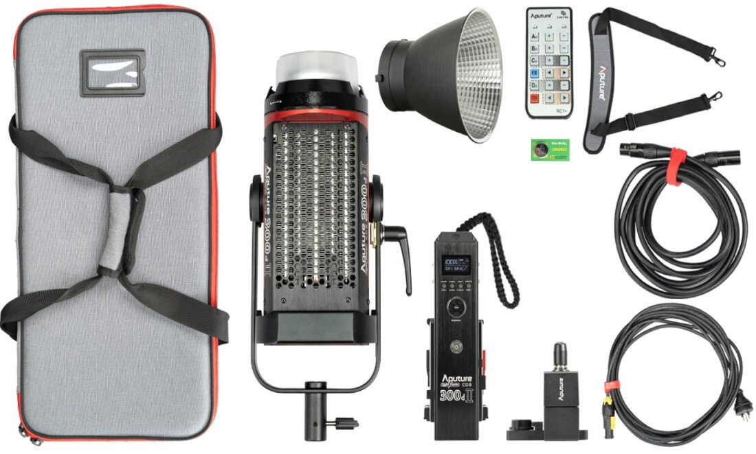 lampa LED APUTURE LS C300D II, kontroler z zasilaczem, czasza, uchwyt montażowy, pilot, zestaw kabli, walizka transportowa, instrukcja obsługi oraz karta gwarancyjna