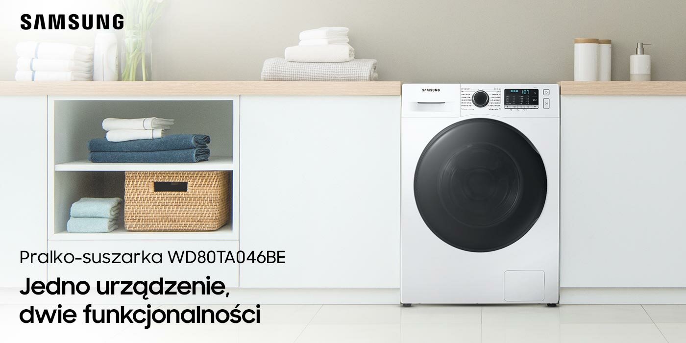 W łazience znajduje się pralko - suszarka a obok na szafkach są ręczniki W łazience znajduje się pralko - suszarka a obok na szafkach są ręczniki