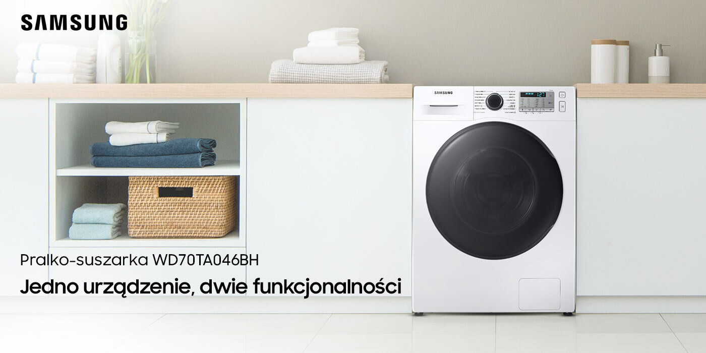 W łazience znajduje się Pralko - suszarka Samsung, w szafce obok oraz na blacie są ręczniki 