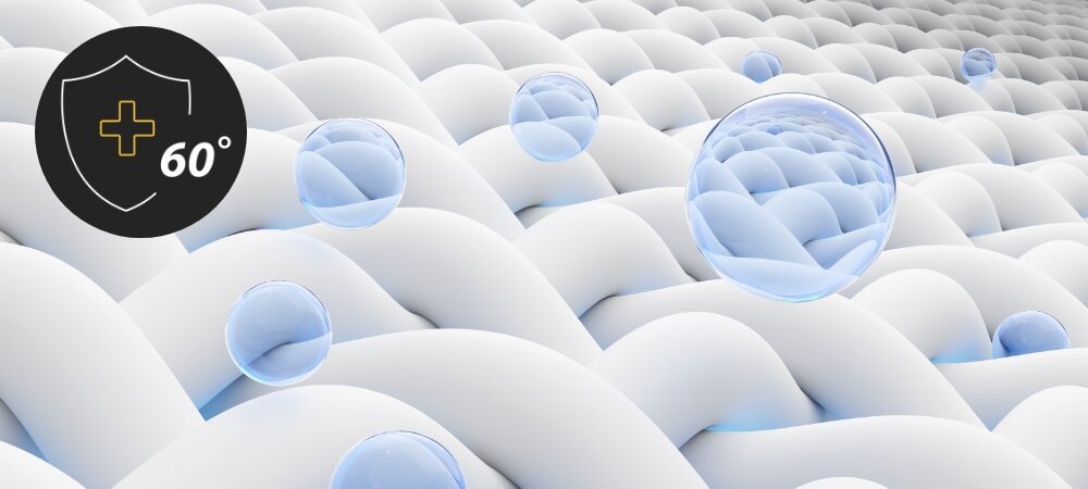 PRALKA WHIRLPOOL TDLR 65230S PL/N Zdjęcie przedstawia powiększoną strukturę tkaniny z ikoną programu odkażającego 60°. Pojawiające się na powierzchni pęcherzyki symbolizują higieniczną czystość dezynfekcja 60°C higiena rodziny oszczędność energii