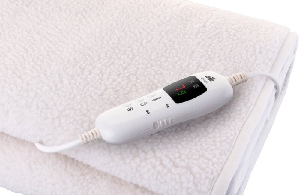 Koc elektryczny Shawn 532590000 Ciepło pomaga ulżyć w bólach mięśni bólach menstruacyjnych bólach pleców i stawów oraz bólach reumatycznych Wysoka jakość użytkowania zachwycające efekty 