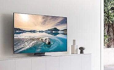 phpr5p39r pl-feature----532491838 Widok na telewizor stojący na szafce. Q95TDTXXH
