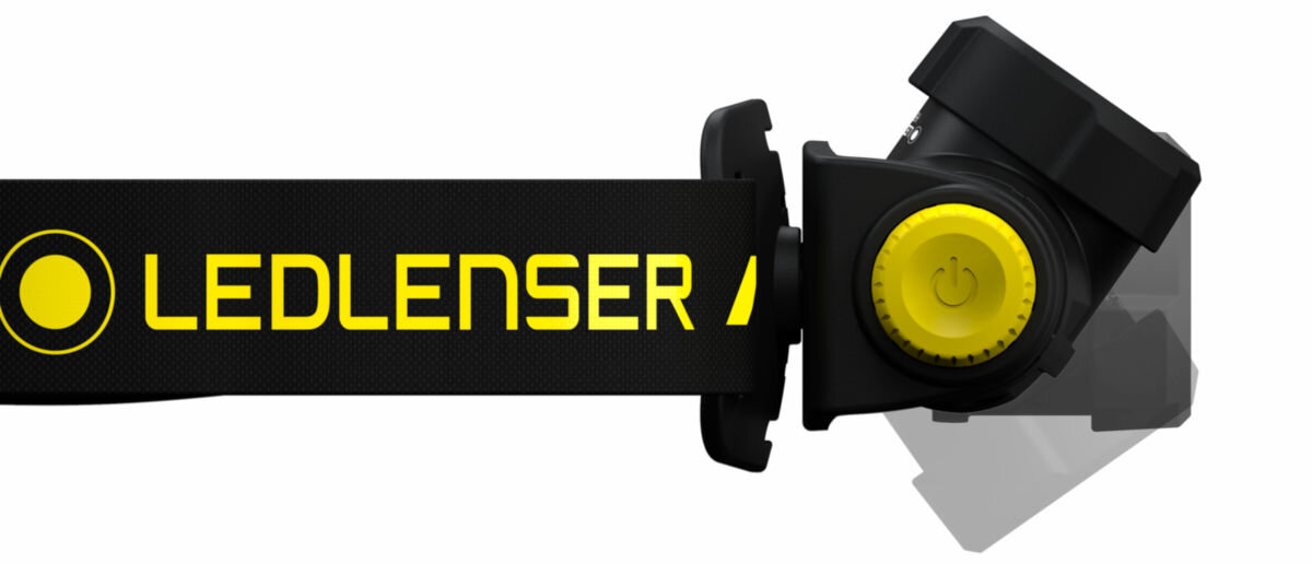 Latarka LEDLENSER H5R Work, boost, tryby, zasięg, mocne, lumeny, na białym tle latarka od boku zbliżenienie na regulator kąta świecenia