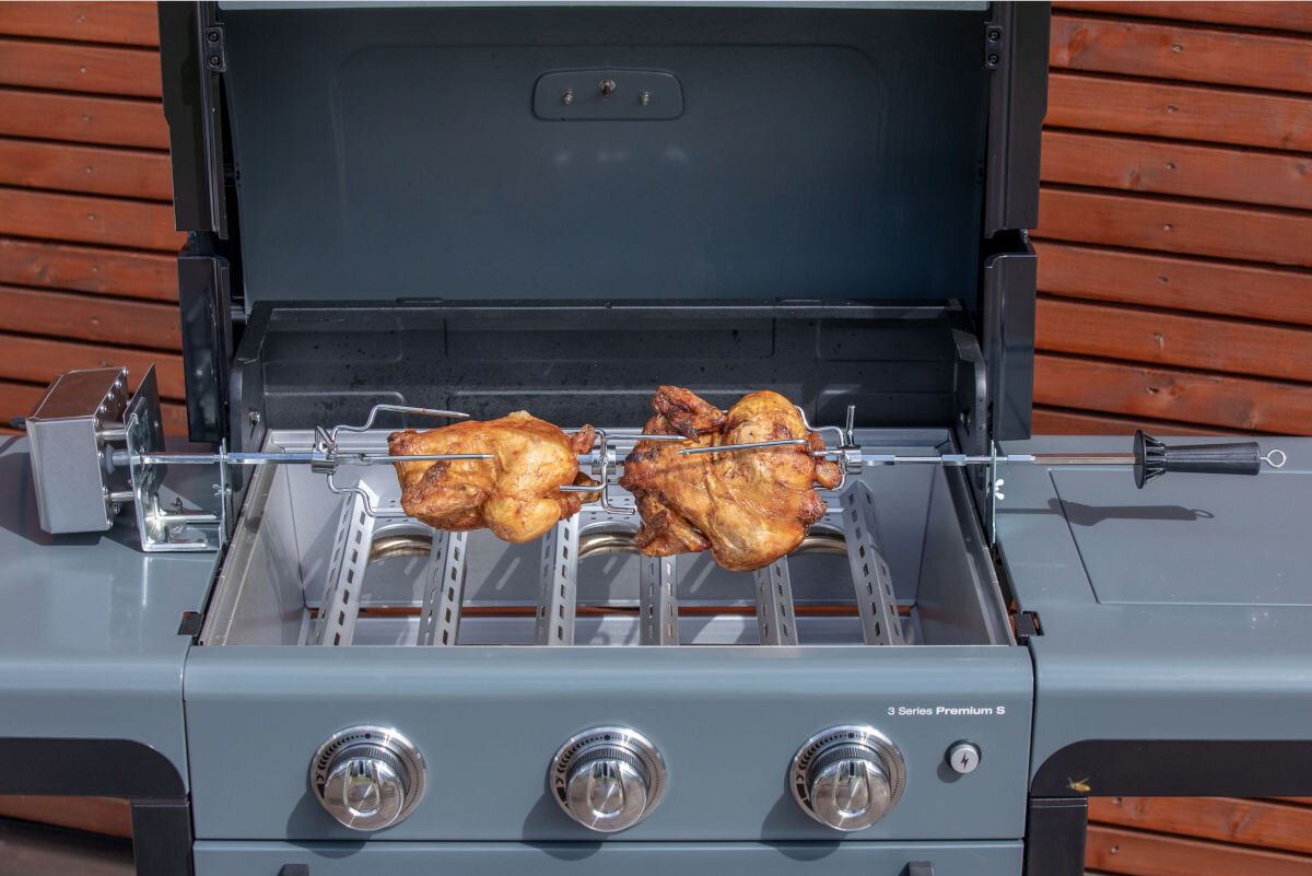 Rożen elektryczny CAMPINGAZ Culinary Modular 2000036962, uzupełnienie, Równomierne, zasilanie, szpikulec, zbliżenie na ruszt grilla z rożnem