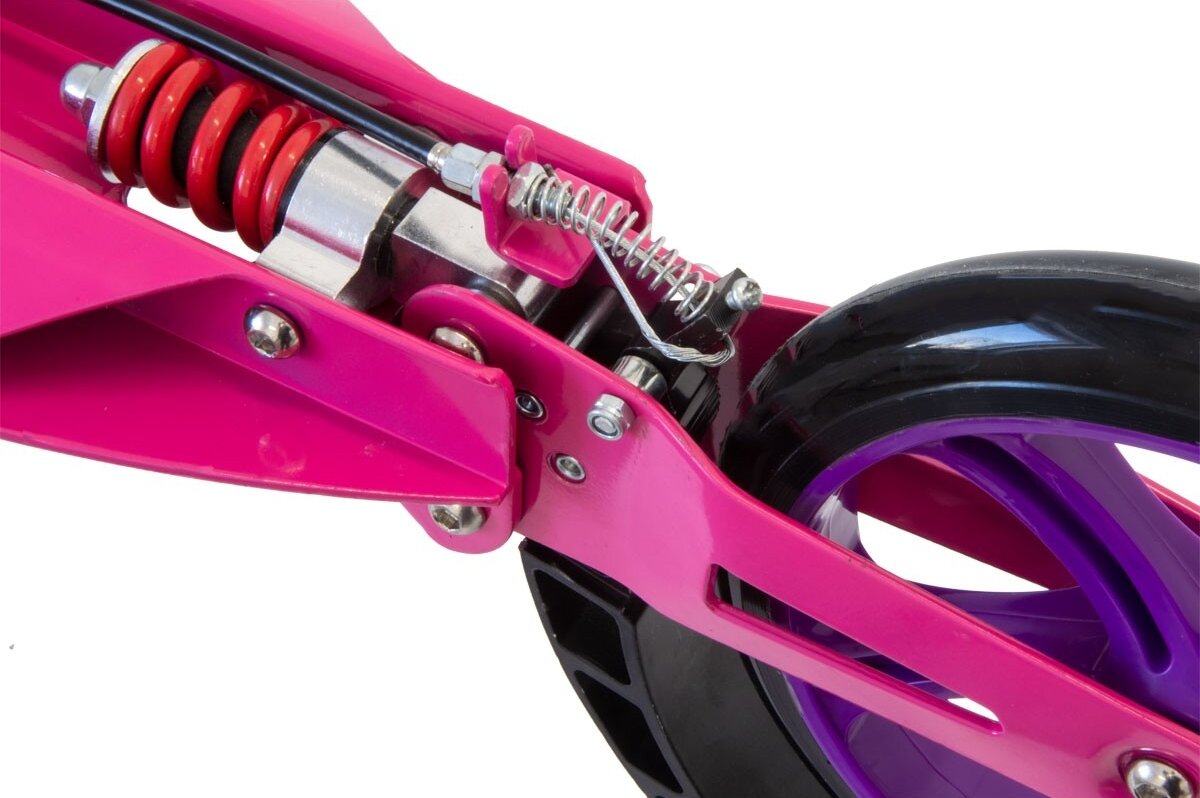 Hulajnoga PB Damper Różowy zbliżenie na amortyzator przedni i tylny amortyzator redukuje drgania prowadzenie jest stabilniejsze wstrząsy nie przenoszą się bezpośrednio na dłonie i nadgarstki zwiększa komfort jazdy poprawia kontrolę nad pojazdem zmniejsza zmęczenie