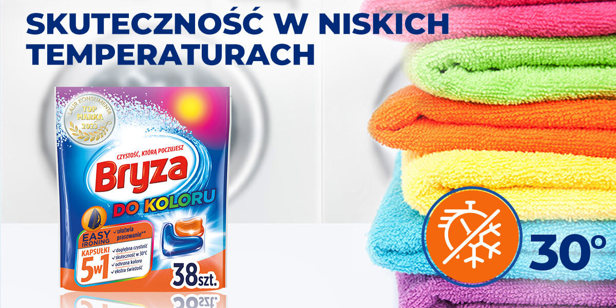 Kapsułki do prania BRYZA 5 w 1 Easy Ironing - 38 szt. opakowanie kapsułek obok kolorowych ręczników napis skuteczność w niskich temperaturach