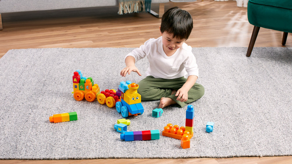 Klocki plastikowe FISHER PRICE Mega Bloks Muzyczny pociąg ABC - rozwój zdolności
