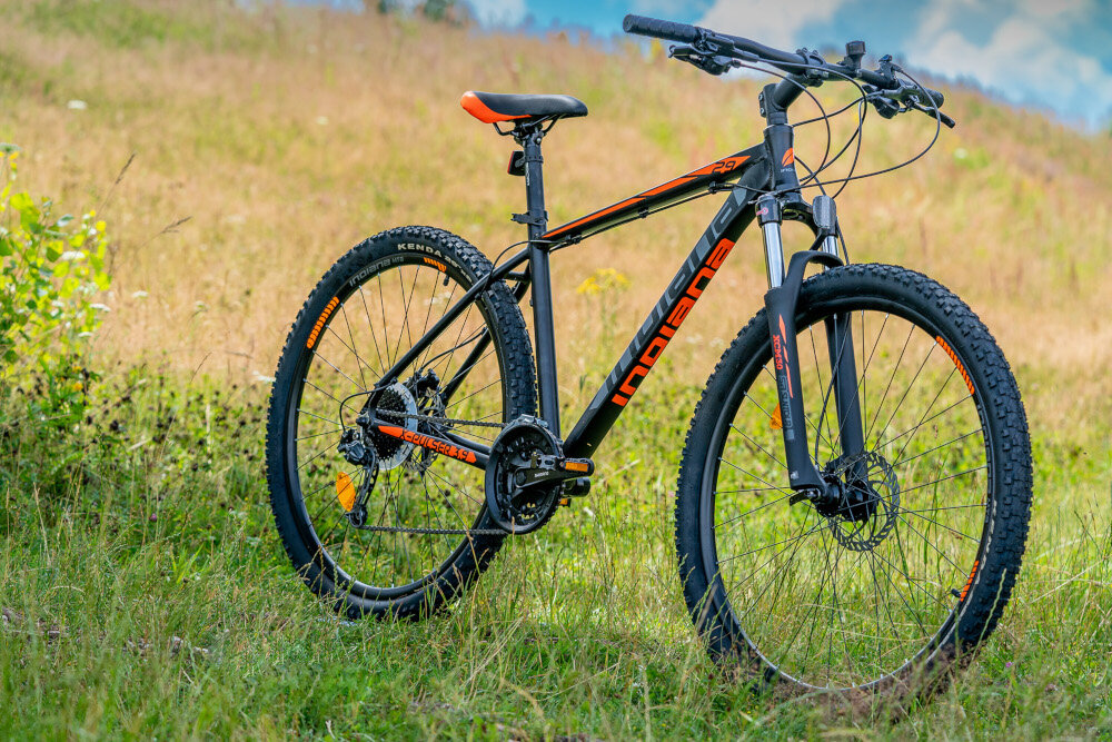 Rower górski MTB INDIANA X-Pulser 3.9 M19 29 cali męski Czarno-pomarańczowy w klasycznej czerni z pomarańczowymi akcentami dla mężczyzn do jazdy po trudnym terenie