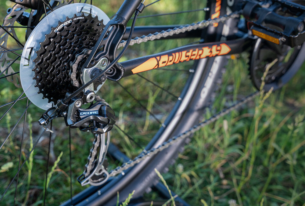 Rower górski MTB INDIANA X-Pulser 3.9 M19 29 cali męski Czarno-pomarańczowy przerzutki na przód i na tył marki SHIMANO 27 biegów przerzutka przednia SHIMANO Acera przerzutka tylna SHIMANO Deore niezawodność niemalże niezniszczalne