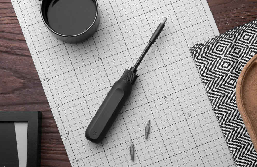 Śrubokręt Xiaomi Mi 16-in-1 Ratchet Screwdriver majstersztyk innowacyjności opatentowany system przechowywania bitów przyciski boczne przedłużacz długość 105 mm odłączany