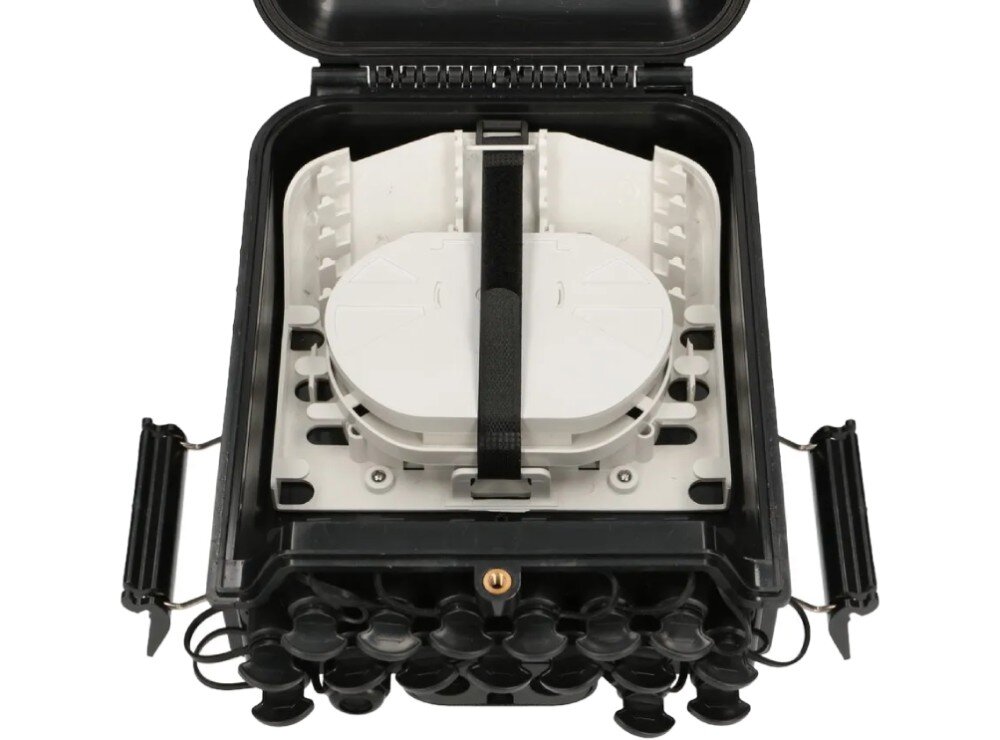 Puszka połączeniowa EXTRALINK EX.17559 Wnętrze otwartej czarnej obudowy z białym elementem montażowym zabezpieczonym czarnym paskiem