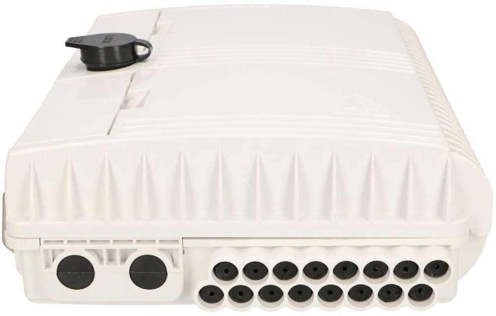 Puszka połączeniowa EXTRALINK EX.12622 Widok na dolną krawędź puszki z dwoma większymi otworami wlotowymi zabezpieczonymi czarnymi zaślepkami oraz szesnastoma mniejszymi otworami wyjściowymi rozmieszczonymi w dwóch rzędach