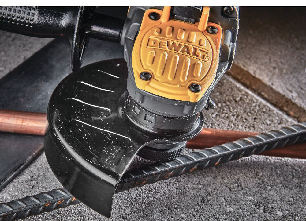 Szlifierka kątowa DEWALT DCG409T1 przycisk blokady wrzeciona M14