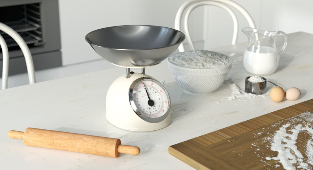 Waga kuchenna ETA Storio 577790040 beżowa waga stoi na blacie srebrna miska duży panel wskaźnik obok rozsypana mąka wałek trwałość funkcjonalność mechaniczna konstrukcja wydajność wytrzymała w całości metalowa obudowa trwałość antypoślizgowe nóżki bezpieczne i komfortowe użytkowanie 