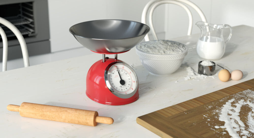 Waga kuchenna ETA Storio 577790030 czerwona waga stoi na blacie srebrna miska duży panel wskaźnik obok rozsypana mąka wałek trwałość funkcjonalność mechaniczna konstrukcja wydajność wytrzymała w całości metalowa obudowa trwałość antypoślizgowe nóżki bezpieczne i komfortowe użytkowanie 