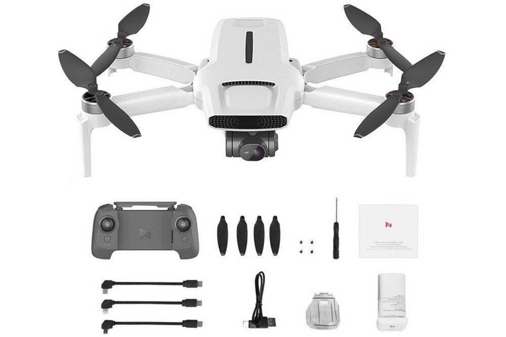 Dron FIMI X8 Mini Pro bateria lot sterowanie akrobacje czas lotu zasięg funkcje lądowanie kamera rozdzielczość filmy zdjęcia nagrywanie jakość ładowanie aplikacja przesył pilot śmigła stabilizacja fotografia waga wymiary konstrukcja obudowa korpus ramiona silnik