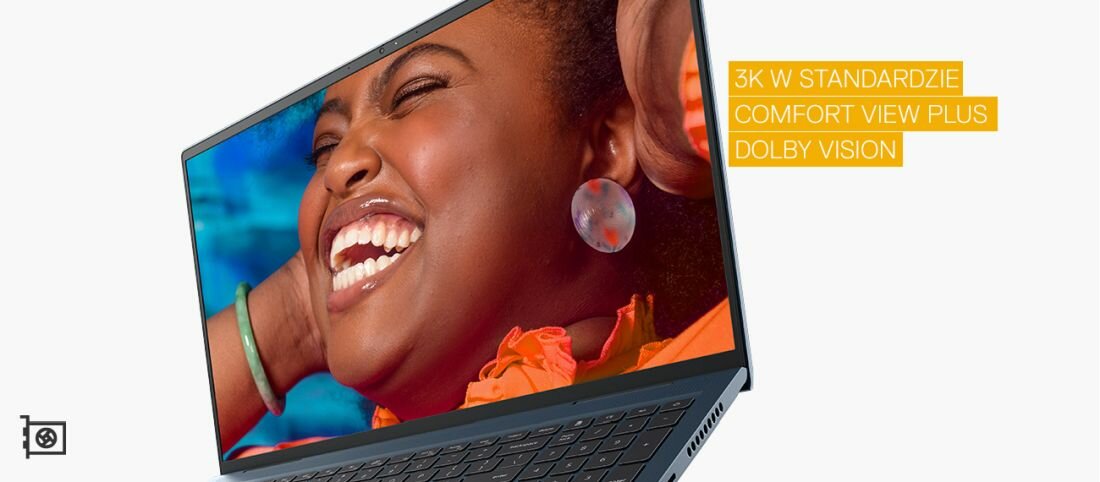 Na obrazie widoczny jest laptop z ekranem wyświetlającym uśmiechniętą osobę. Obok znajduje się tekst: \'3K W STANDARDZIE COMFORT VIEW PLUS DOLBY VISION\'.