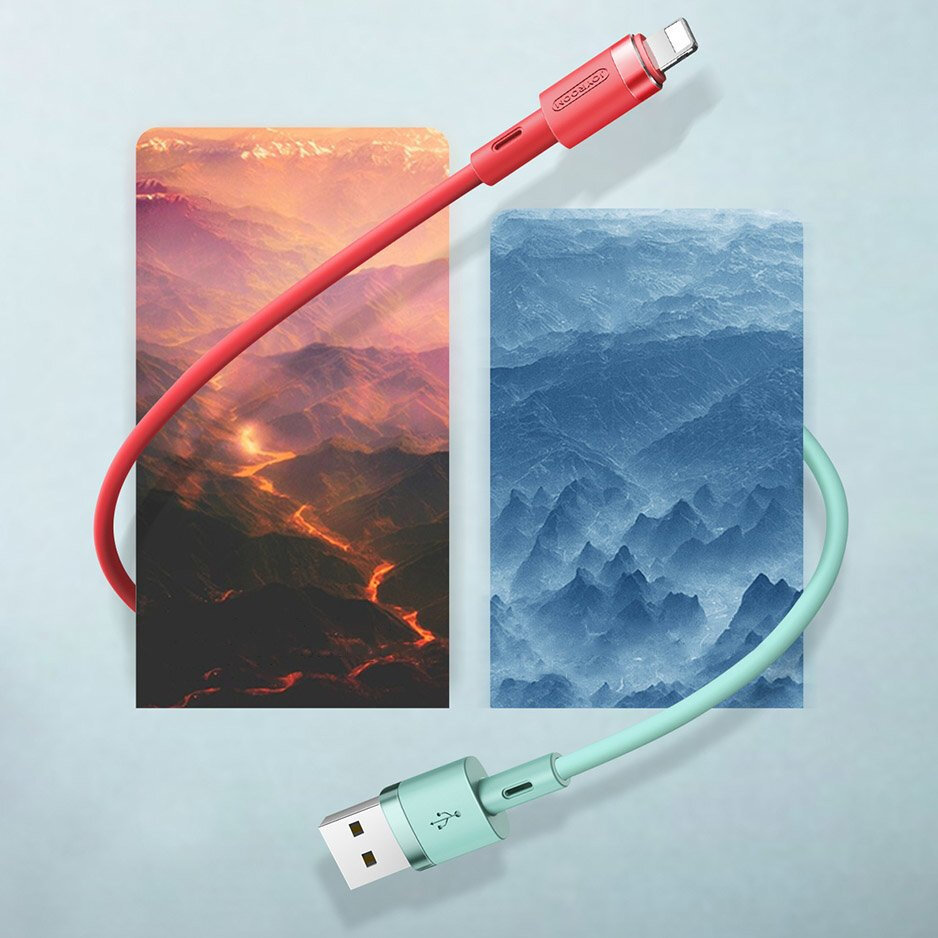 Obraz przedstawia dwa kable USB/Lightning w różnych kolorach: czerwonym i miętowym, na tle dwóch krajobrazów górskich w odcieniach pomarańczowym i niebieskim. Na czerwonym kablu widoczne jest logo \'VOXLINK\'.