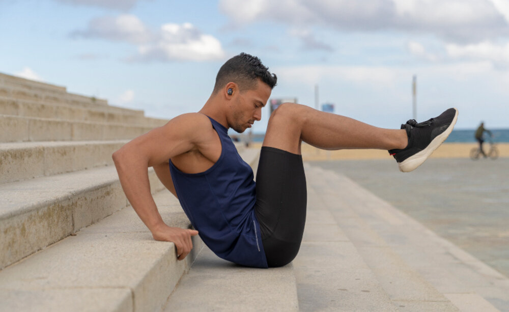 Słuchawki dokanałowe JBL Reflect Flow Pro bezprzewodowe komfortowe szybkość stabilność aktywność