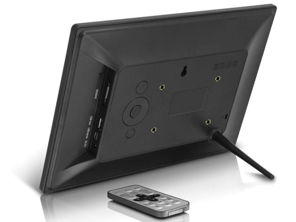 BRAUN DF 1094 cyfrowej ramce na zdjęcia i filmy nieskończonej pętli Braun DF 1094 zdjęć w rozdzielczości 1024 × 600 px pikseli formacie 16:9 filmy (MPEG1, MPEG2 i MPEG4) dwóm wbudowanym głośnikom (dla audio MP3 i WMA) odtwarzania zdjęć w formie prezentacji slajdów podkładem muzycznym - ramka od tyłu na białym tle