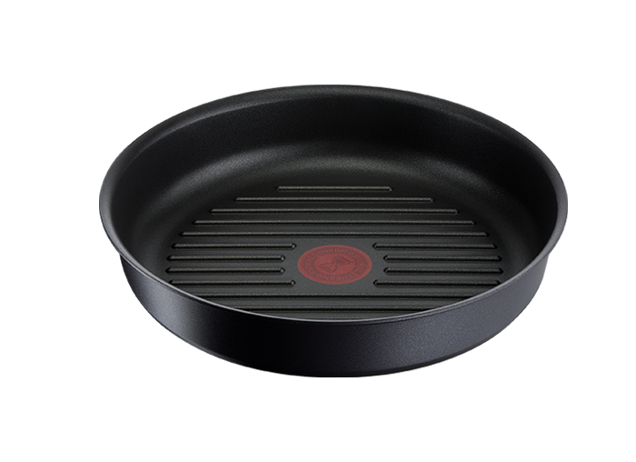 Czarna patelnia grillowa z rowkowanym dnem i czerwonym okrągłym wskaźnikiem temperatury na środku.