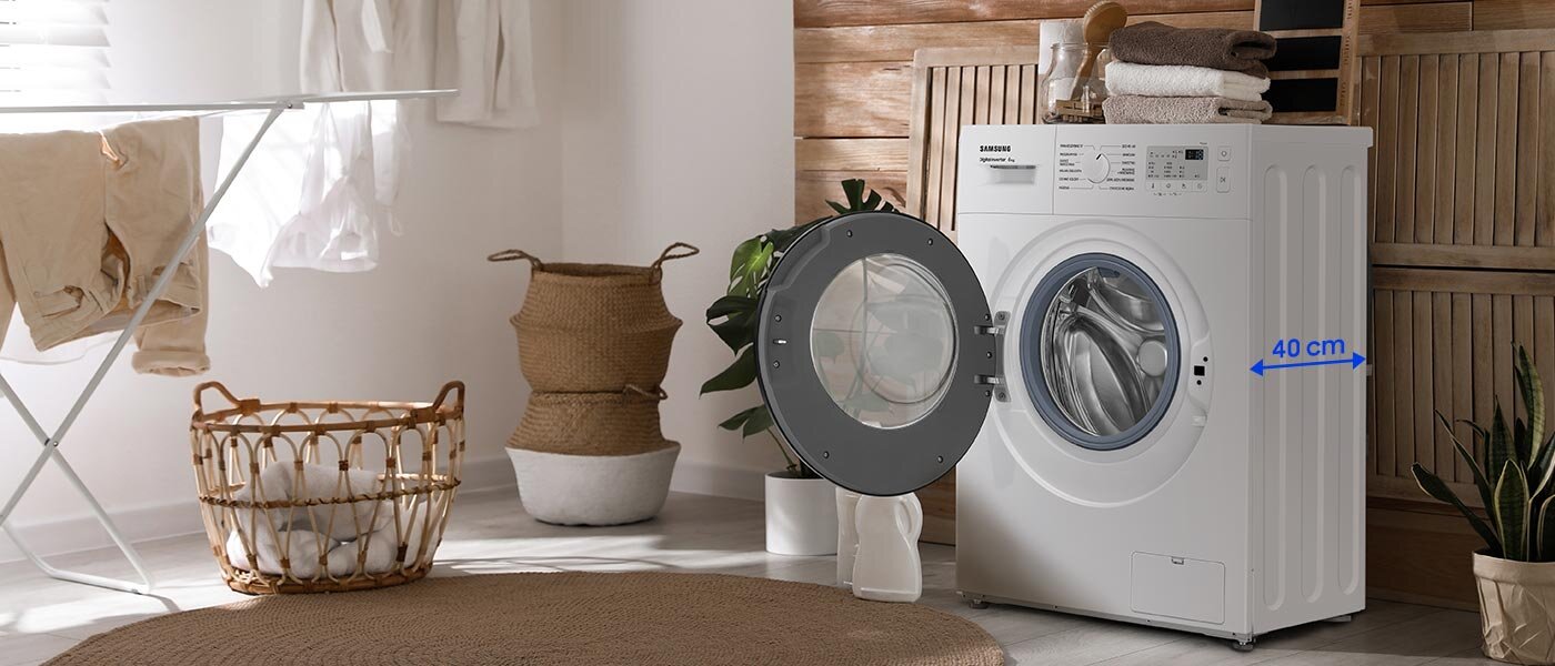 Pralka z otwartymi drzwiami, na których widoczny jest napis \'40 cm\'. Na pralce znajduje się logo \'SAMSUNG\'.