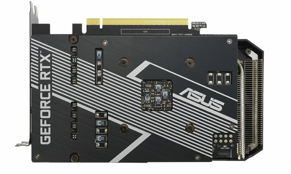Obraz przedstawia tylną część karty graficznej z widocznym logo ASUS i napisem \'GeForce RTX\'.