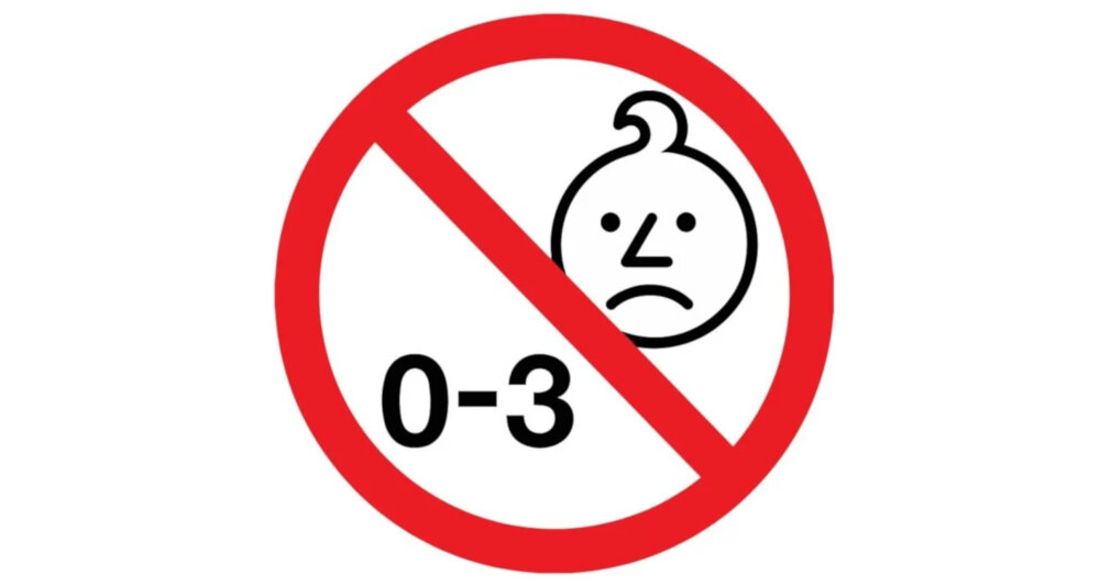 Czarno-biała ikona smutnej twarzy dziecka z zakazującym czerwonym znakiem i tekstem \'0-3\'.