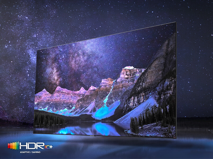 phpkeevmk pl-feature-cinematic-scale-in-deeper-contrast-531081365 Telewizor QLED wyświetla detale i kontrasty obrazu przyrodniczego dzięki Quantum HDR 12x. Na dole znajduje się logo HDR 10+ ADAPTIVE/GAMING. Q80BATXXH
