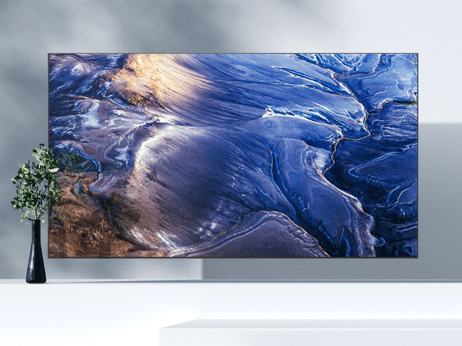 Телевізор QLED відображає матову хвилеподібну графіку без відблисків.