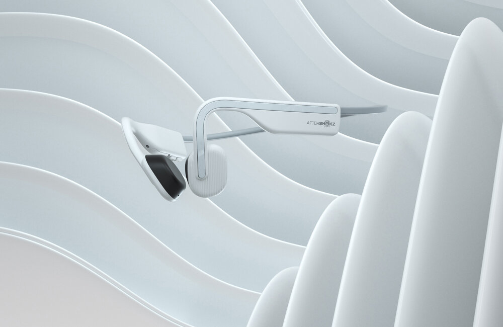 SŁUCHAWKI BLUETOOTH AFTERSHOKZ OPENMOVE KOSTNE BIALE wbudowany mikrofon trieningi muzyka sportowcy