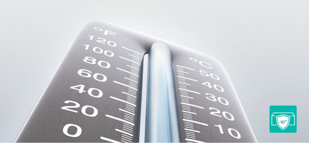 ZAMRAŻARKA GORENJE FH25EAW Termometr z podziałką w stopniach Celsjusza i Fahrenheita na jasnym tle, z ikoną wskazującą działanie urządzenia w niskich temperaturach zamrażarka do garażu, zamrażarka do piwnicy, praca w -15°C, do nieogrzewanych pomieszczeń, odporna na niskie temperatury, zamrażarka niskotemperaturowa, praca w zimnie