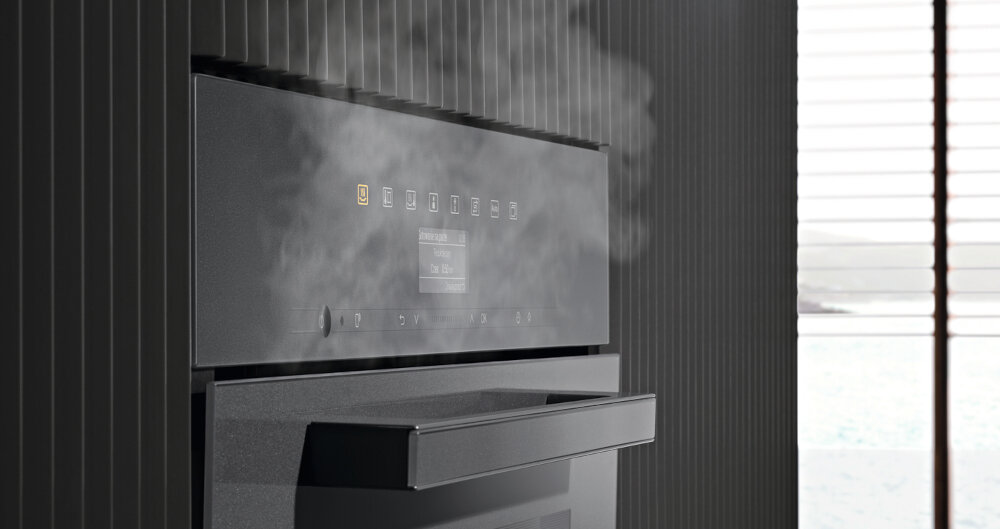 Urządzenie do gotowania na parze MIELE DG 2840 Czarny otwieranie drzwiczek ulatnianie pary