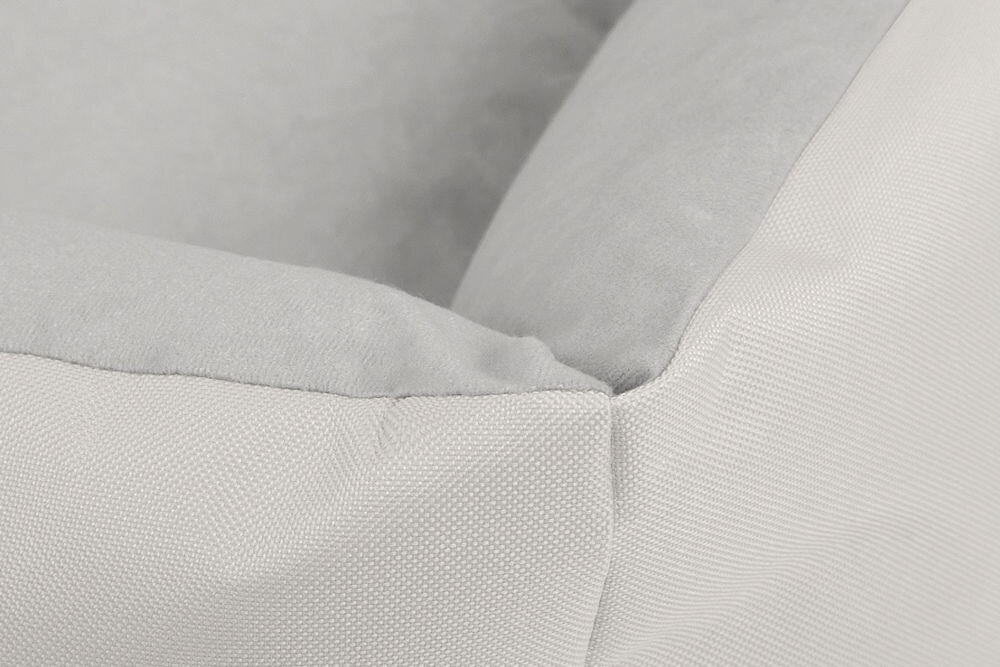 Legowisko dla psa BEDDOG Zara XXL bezowy Ekstremalne zbliżenie na róg szarego legowiska dla psa, ukazujące fakturę materiału (wyraźny splot) i szwy łączące boki i wewnętrzną poduszkę.