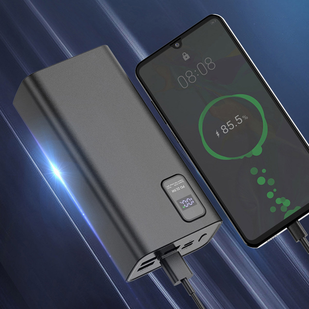 Na obrazie widoczny jest czarny powerbank z wyświetlaczem LED pokazującym \'75%\'. Obok znajduje się smartfon z ekranem wskazującym poziom naładowania baterii \'85.5%\'.