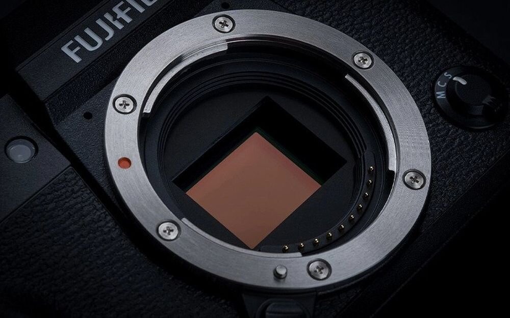 Aparat FUJIFILM X-T30 II zdjęcia obiektyw ekran wizjer ogniskowa przysłona migawka obudowa bateria zasilanie filmy nagrywanie rozdzielczość matryca rozmiar przekątna tryby iso montaż lampa światło przyciski sterowanie menu kontrast jasność balans bieli filtry cmos karta pliki format zapis seria