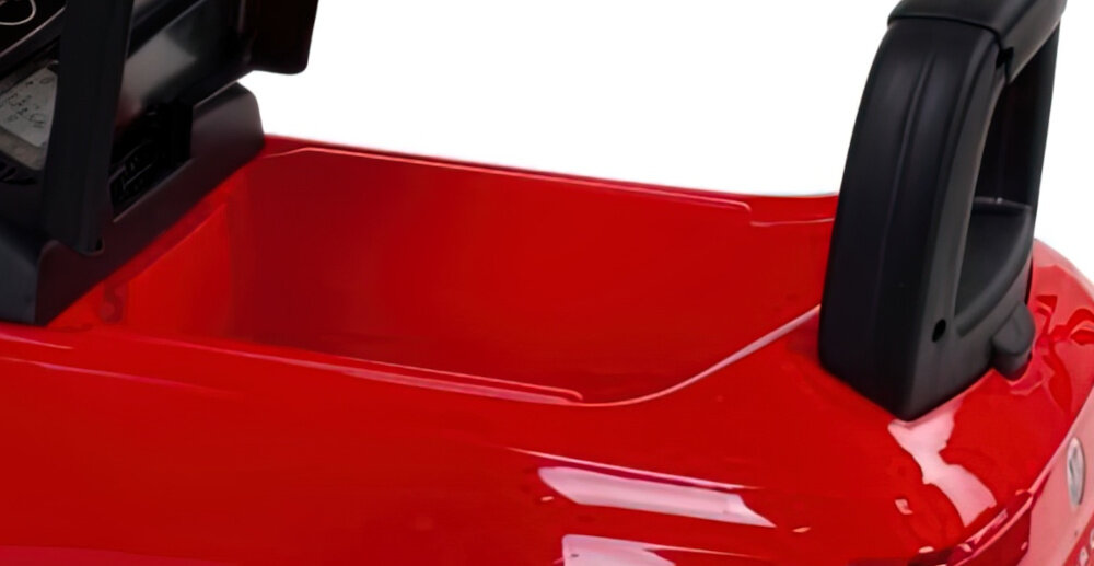 Jeździk SUN BABY Volkswagen T-Roc Biały zbliżenie na schowek schowek umieszczony pod siedziskiem można przechowywać drobiazgi rozwija poczucie odpowiedzialności i uczy organizacji