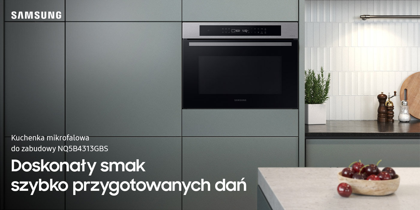 Srebrnoszara kuchnia, w której stoi kuchenka mikrofalowa do zabudowy NQ5B4313GBS. Urządzenie dostępne jest w ofercie sklepu Media Expert.