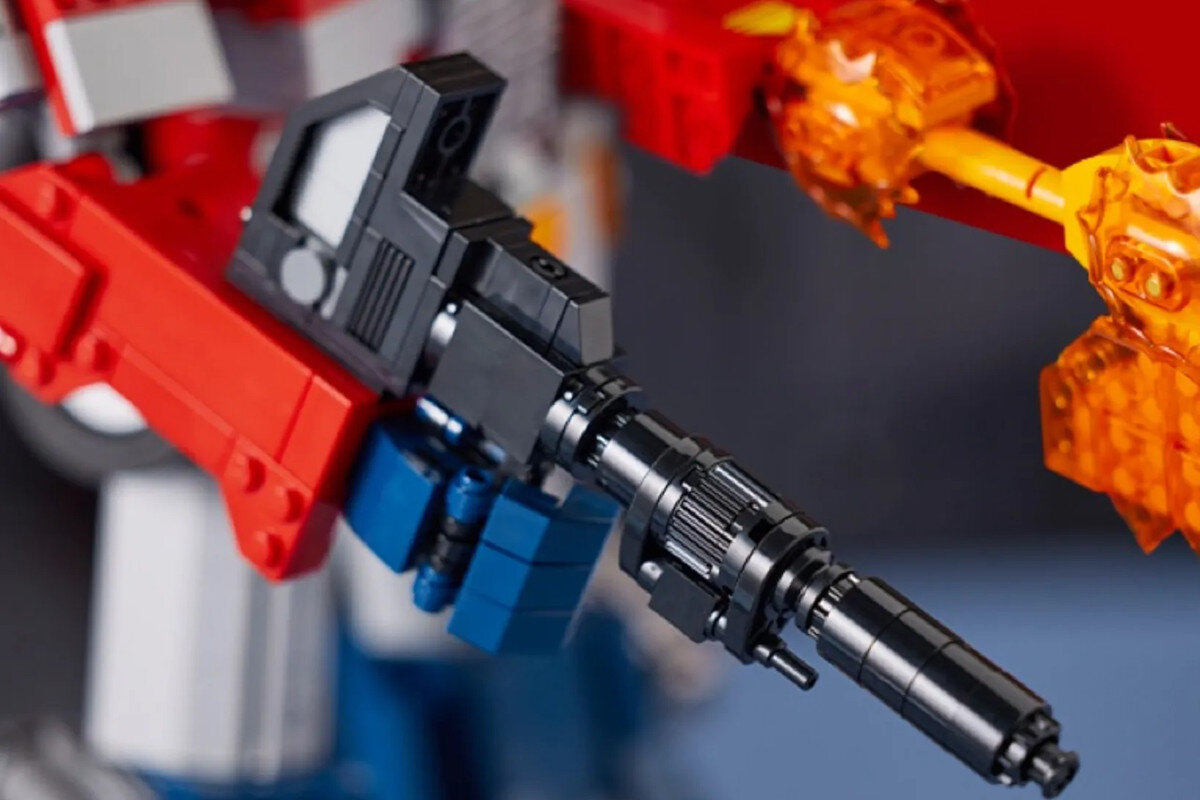 LEGO Icons Optimus Prime 10302 blaster topor kostka plecak