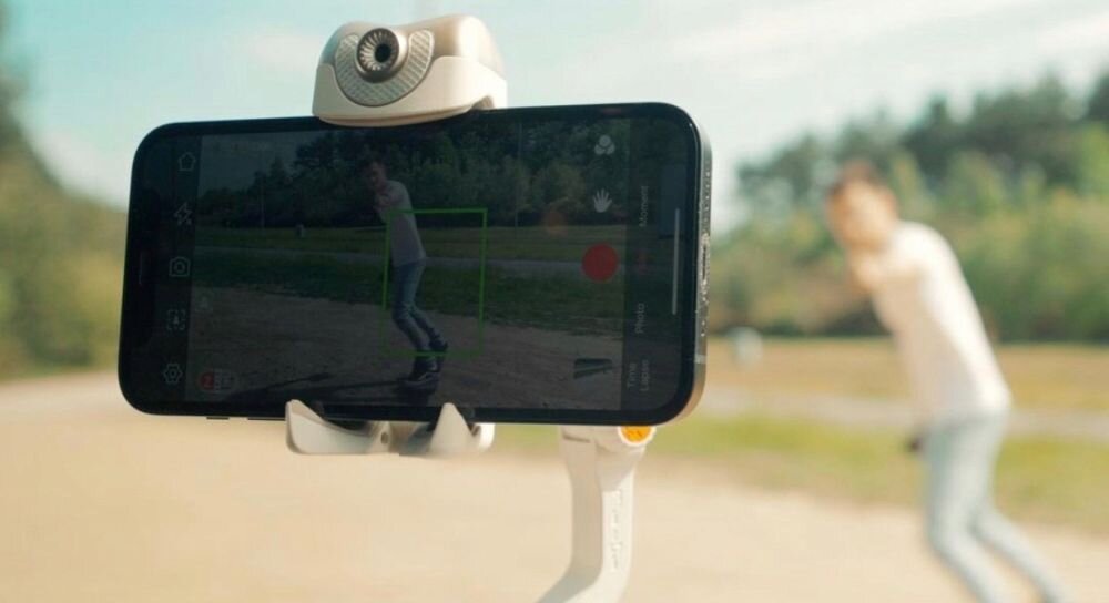 Gimbal ręczny HOHEM iSteady V2 fotografia stabilizacja nagrywanie żyroskop uchwyt zasilanie ładowanie bateria tryby przyciski złącza porty kompatybilność udźwig wykonanie pojemność