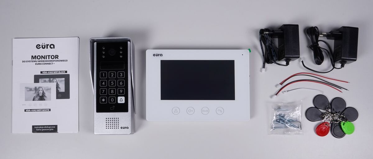 Wideodomofon EURA VDP-90A3 Delta+ Bezprzewodowy Wi-Fi, Pełny zestaw: monitor, stacja zewnętrzna, zasilacze i akcesoria, monitor, kaseta, zasilacz, instrukcja.