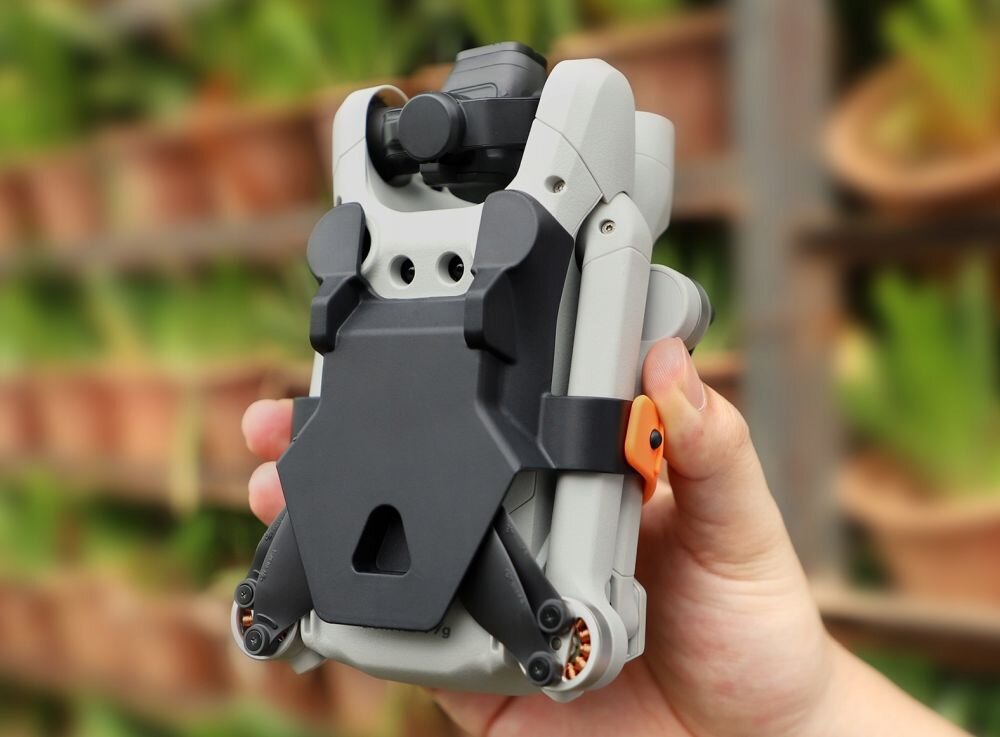 Blokada śmigieł SUNNYLIFE MM3-SJ398 do Dji Mini 3 Pro bateria lot sterowanie akrobacje czas lotu zasięg funkcje lądowanie kamera rozdzielczość filmy zdjęcia nagrywanie jakość ładowanie aplikacja przesył pilot śmigła stabilizacja fotografia waga wymiary konstrukcja obudowa korpus ramiona silnik