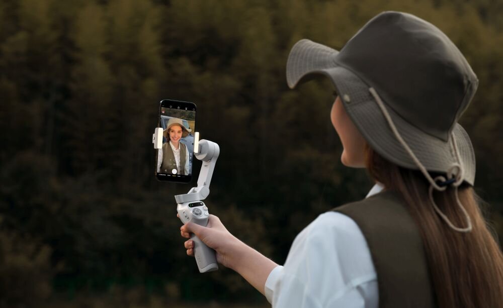 Gimbal DJI Osmo Mobile SE fotografia stabilizacja nagrywanie żyroskop uchwyt zasilanie ładowanie bateria tryby przyciski złącza porty kompatybilność udźwig wykonanie pojemność