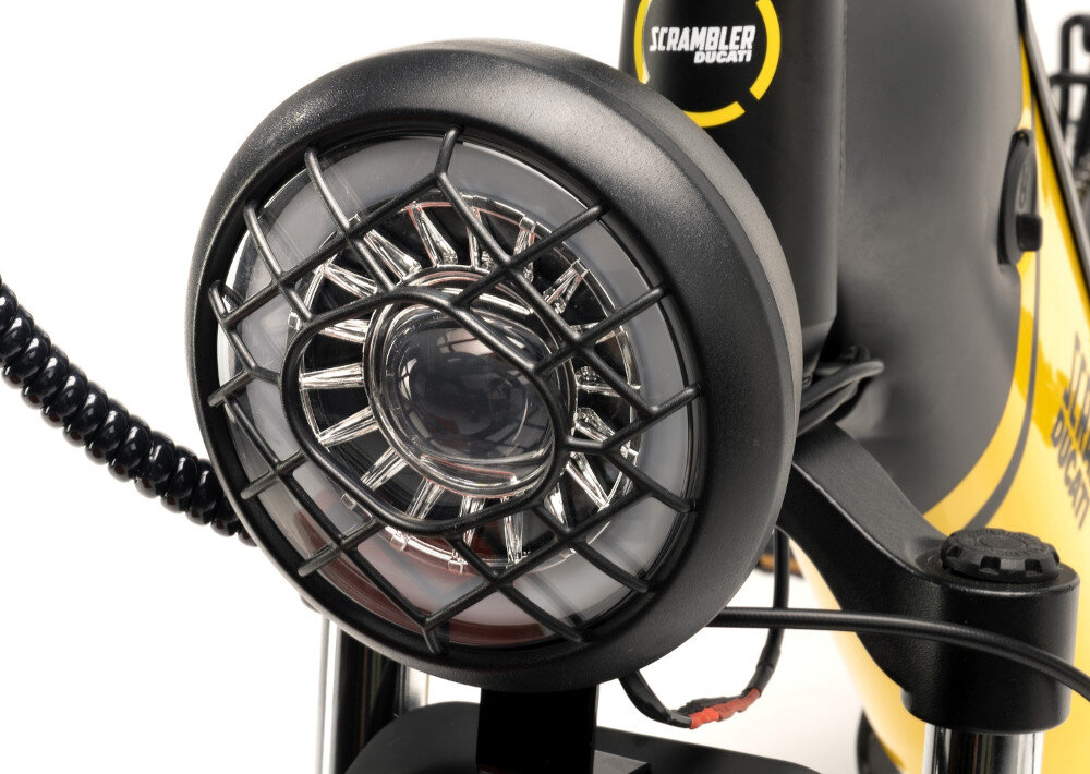Rower elektryczny DUCATI Scrambler SCR-X U17 20 cali Czarno-żółty zbliżenie na przednie światło bezpieczeństwo zintegrowane przednie światło i tylne oświetlenie dobra widoczność bezpieczeństwo światła zasilane są bezpośrednio z akumulatora