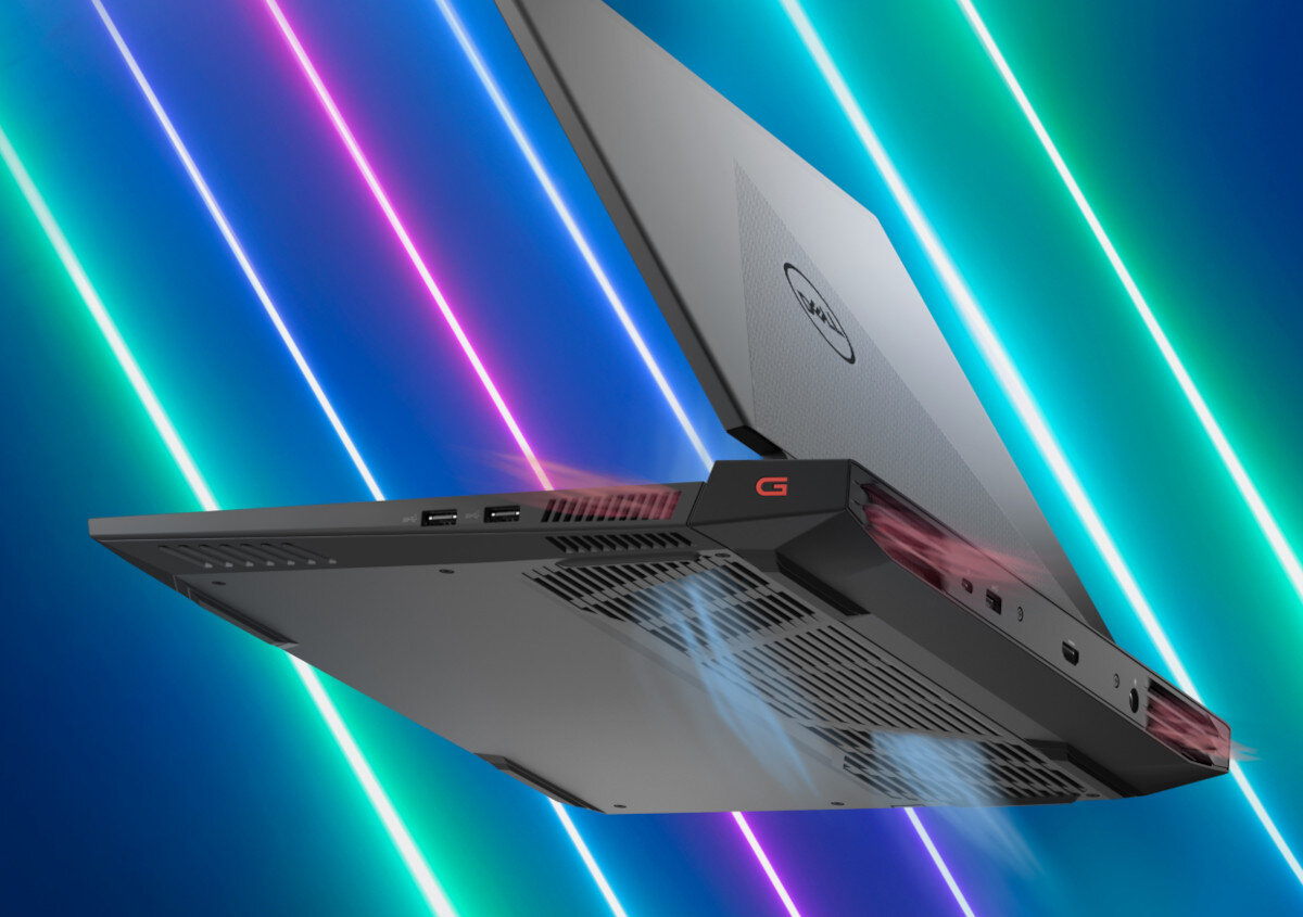 Laptop z widocznymi portami USB i otworami wentylacyjnymi, na tle kolorowych, neonowych linii. Na obudowie widoczne jest logo \'dell\'.